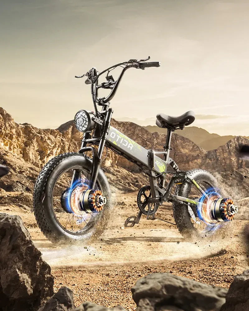 OTIDA R7 MAX Dual Motor Electric Bike in mid-air on a rocky desert trail with mountains in the background