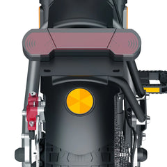 Close-up of a motorcycle's front suspension system with a yellow shock absorber on a white background.