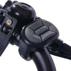 Close-up of a motorcycle handlebar control unit with buttons and switches on a white background