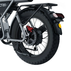 Close-up of a motorcycle wheel with suspension and chain mechanism on a white background