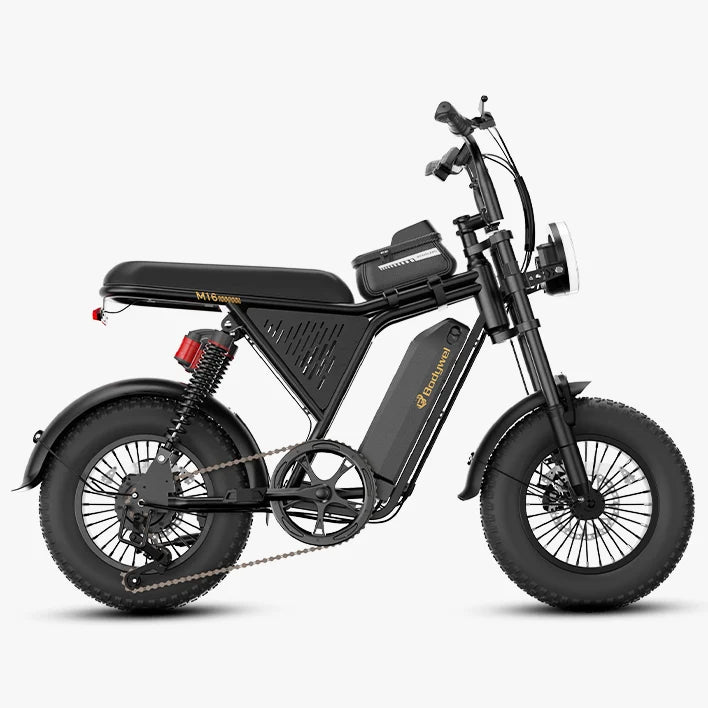 A black Bodywel M16 Pro electric fat-tire motorcycle with gold branding, a rear suspension spring, and a black battery pack mounted on the frame, shown against a light gray background.