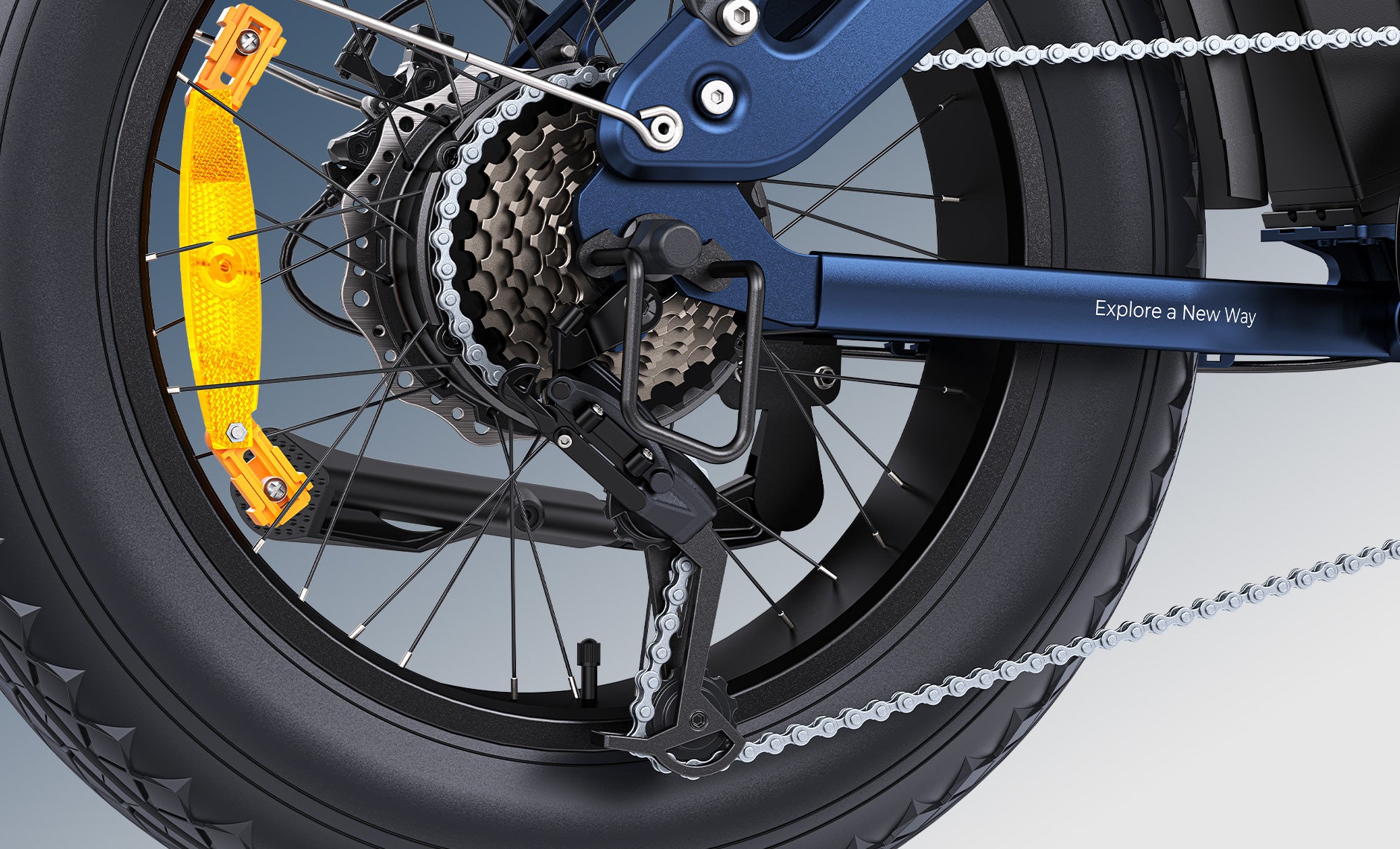Close-up of a Engwe Engine Pro 3.0 Boost Folding Electric bicycle wheel with chain and gear system on a white background