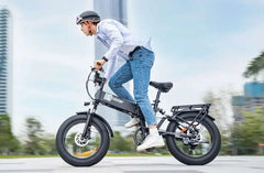 Person riding an electric bike in an urban setting